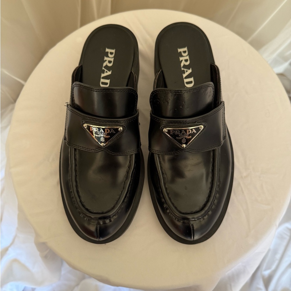PRADA Spazzolato Leather Triangle Logo Loafer Mules / Slides